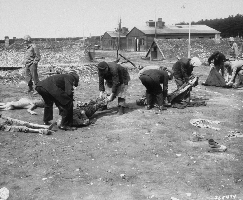German civilians ordered to bury victims at Kaufering IV camp after liberation by American forces April 1945