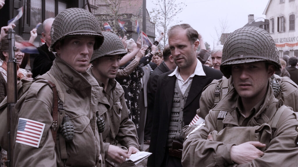 Band of Brothers Episode 4 Replacements — American paratroopers from Easy Company being greeted by Dutch civilians during the liberation of Eindhoven in September 1944