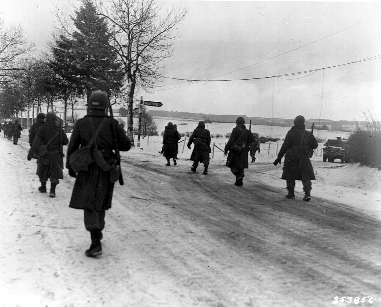 101st Airborne troops marching out of Bastogne after the siege, January 1945