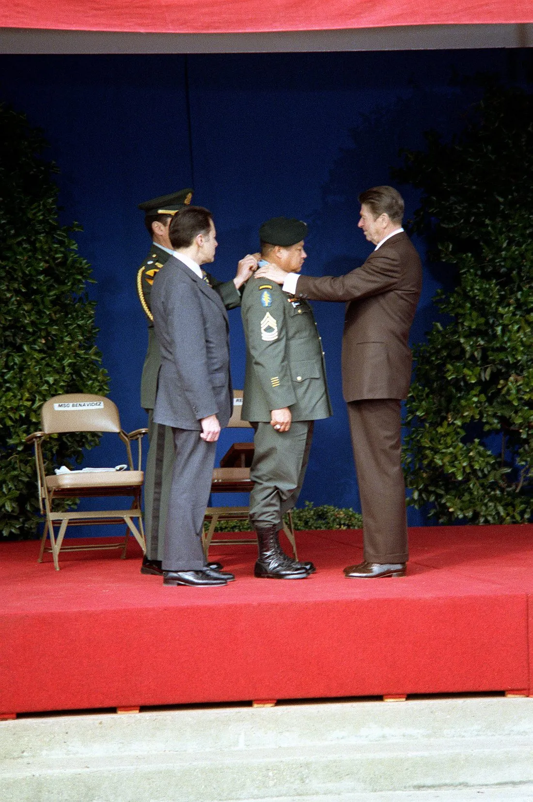 President Ronald Reagan places the Medal of Honor around the neck of Master Sergeant Roy Benavidez at the Pentagon in 1981